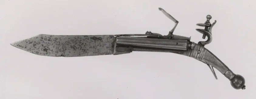 Un couteau pliant combiné à un pistolet à silex à deux canons, métal richement décoré