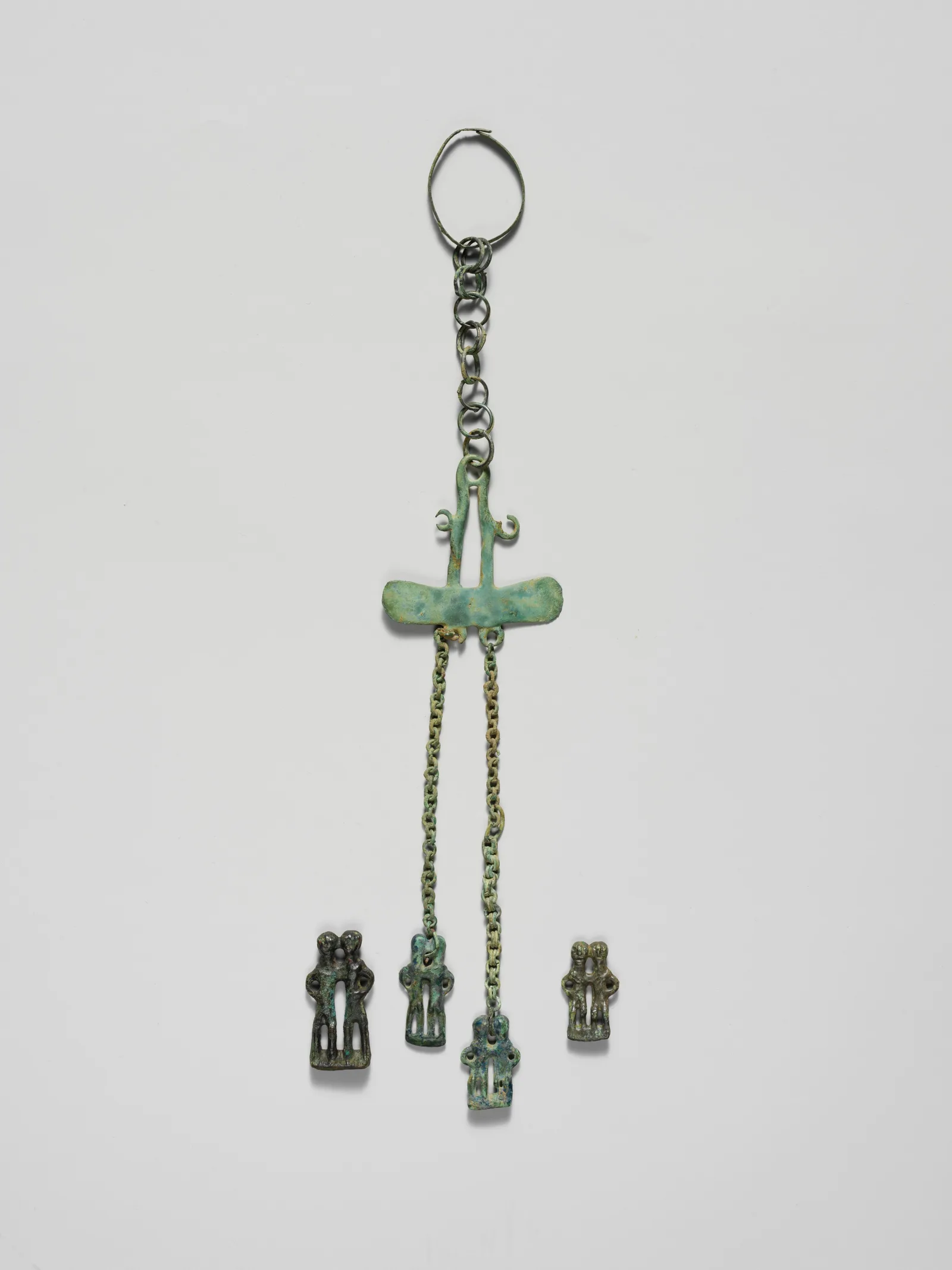 Pendentif en bronze en forme de couple apparié, culture villanovienne, VIIIe siècle avant notre ère
