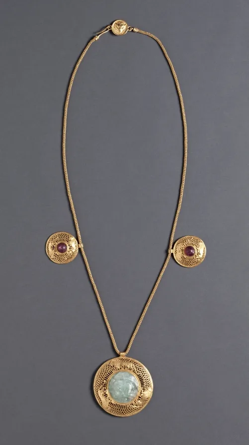 Necklace with three pendants set with golden beryl stones