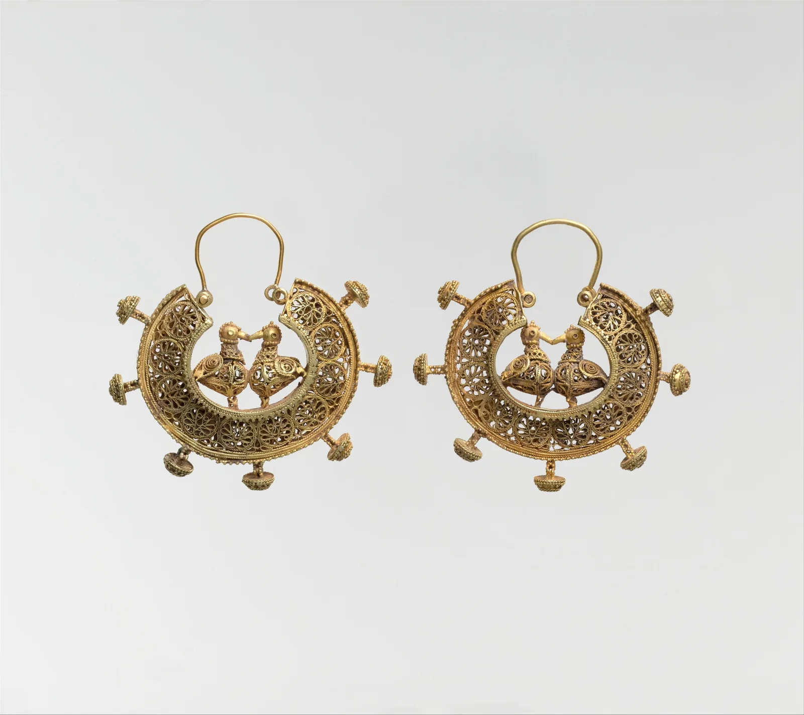 An openwork earring with a geometric pattern