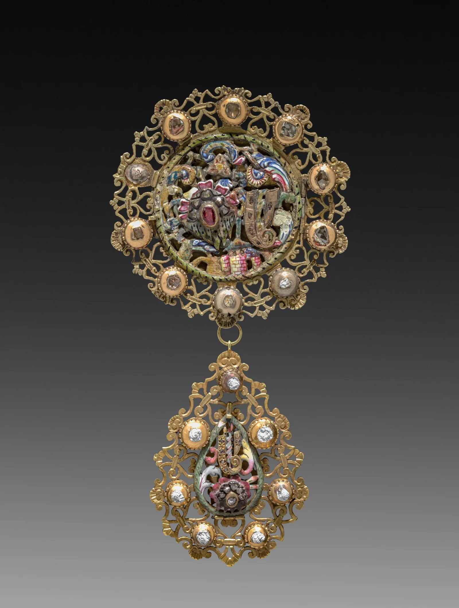 A Belgian silver pendant of the eighteenth century with openwork and hanging elements