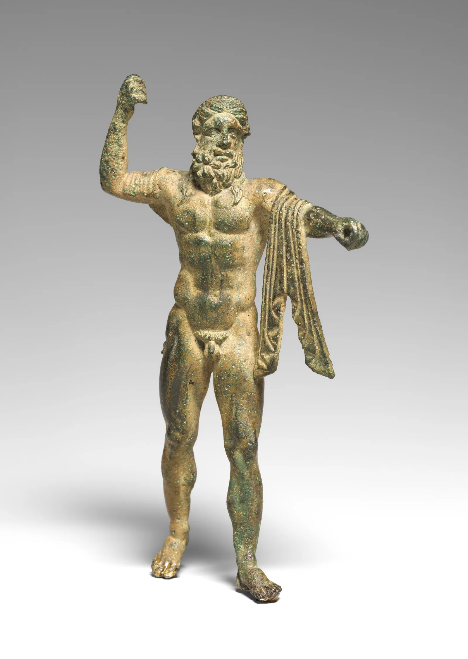 Statuette romaine en bronze de Neptune tenant son trident, début du Ier siècle de notre ère.
