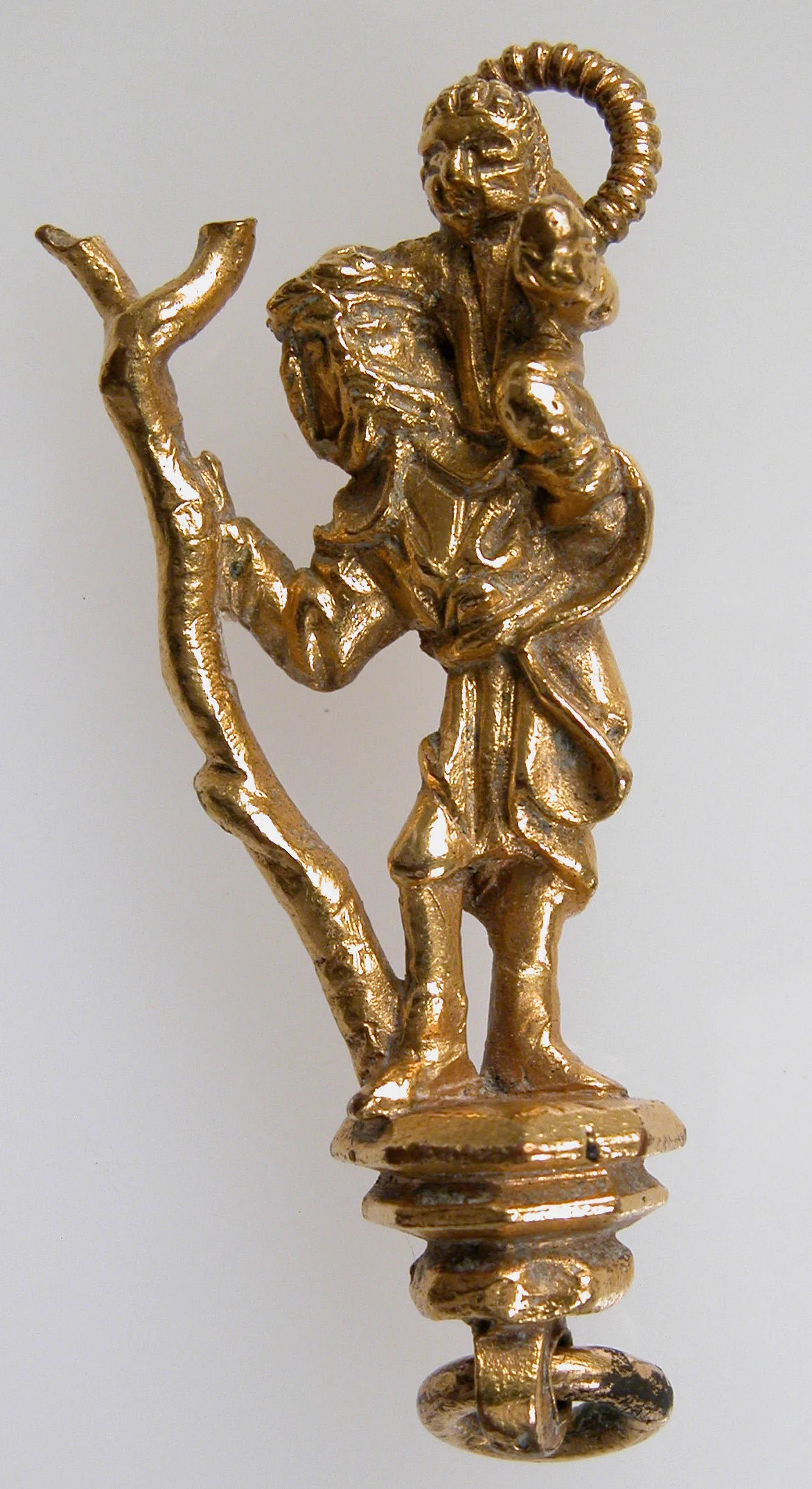 Gilded copper pendant of Saint Christopher carrying the Christ Child, Germany, late 15th century