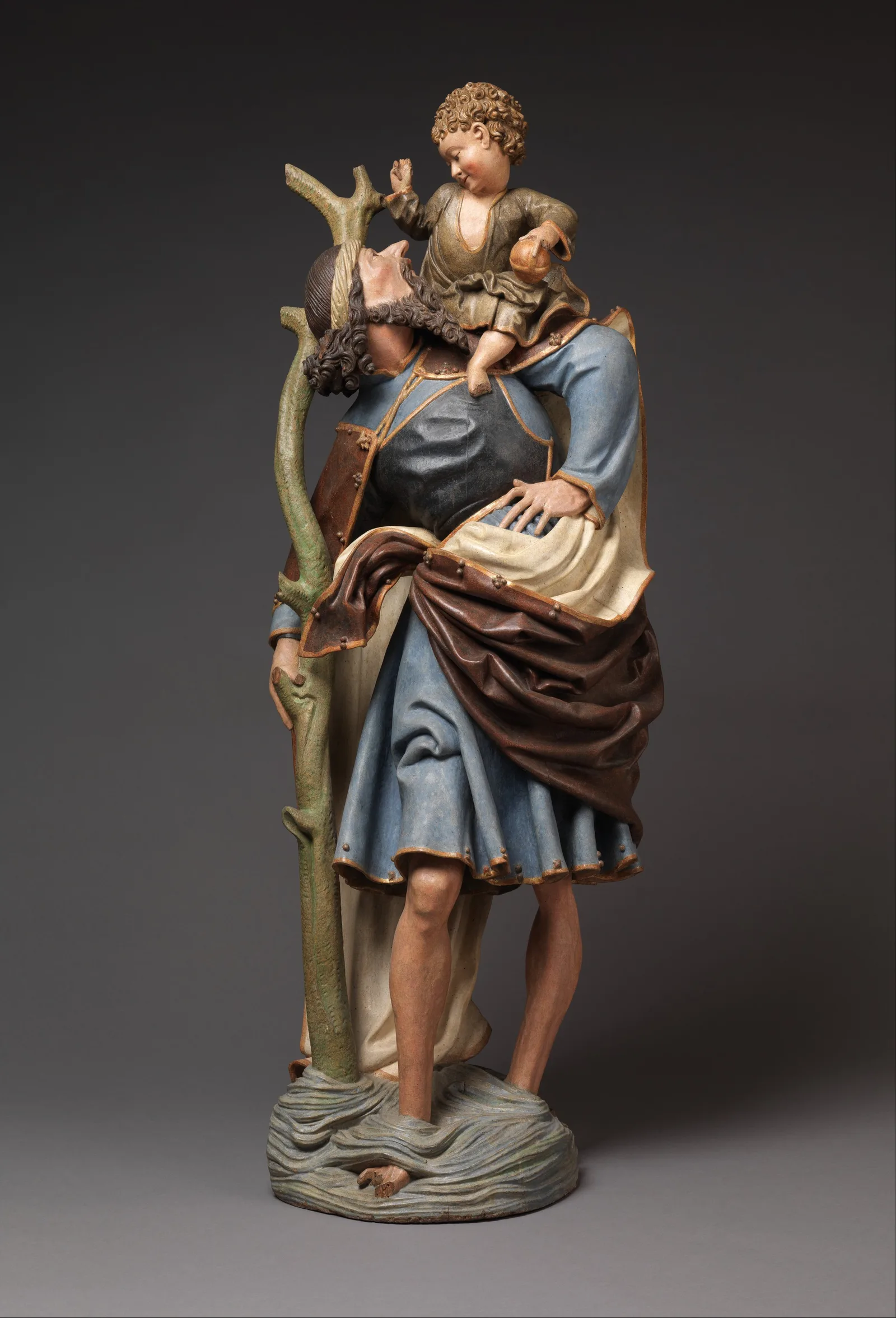 Wooden sculpture of Saint Christopher carrying Christ across the river, Germany, 1510 to 1520