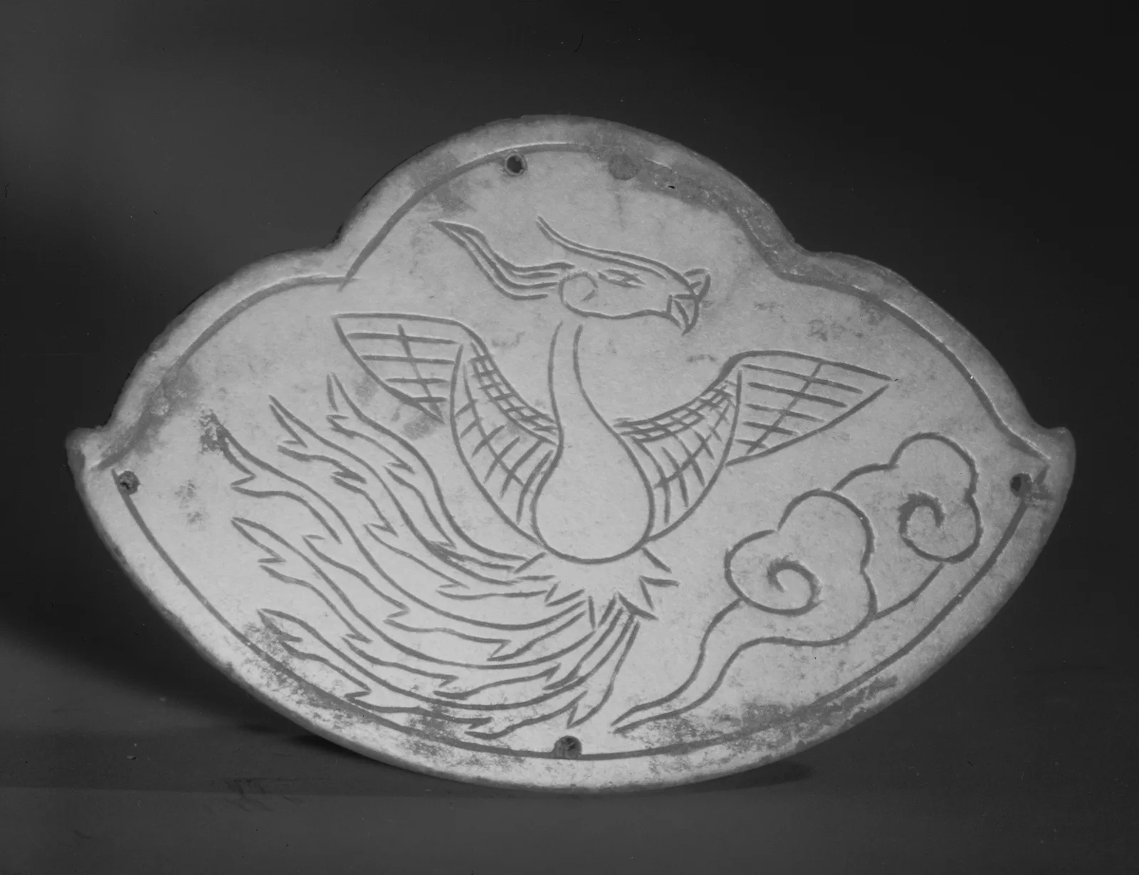 Plaque-pendentif chinoise en jade au décor sculpté, XIIe-XIIIe siècle